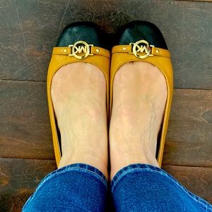 Michael Kors , black and tan flats. One owner. Super comfortable.
